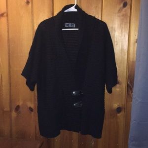 Black knit cardigan with leather snap closures